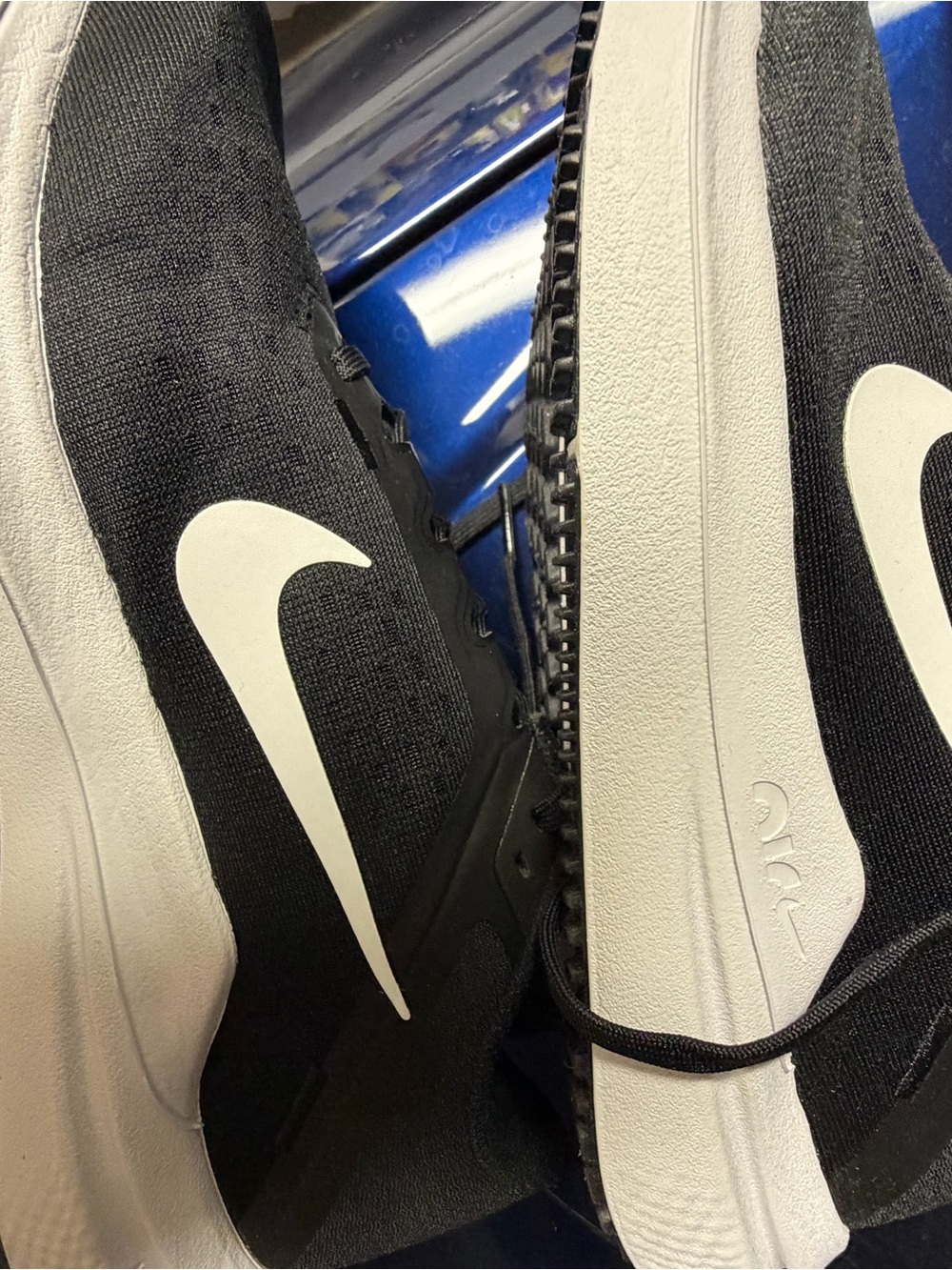 Women’s Nike Black and White Running Shoes with Swoosh